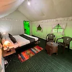 Himalayan Root Swiss Cottage Tents - Camping With Bonfire