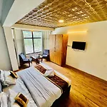 Manali-A River Side Snow Sky Hotel